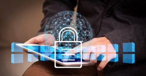 Photo of person using a tablet with padlock image superimposed